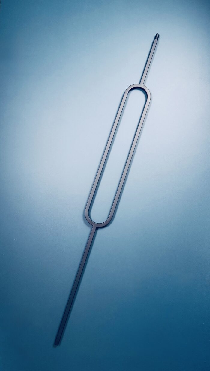 black oval metal spindle