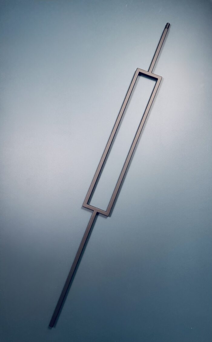 black rectangle metal spindle