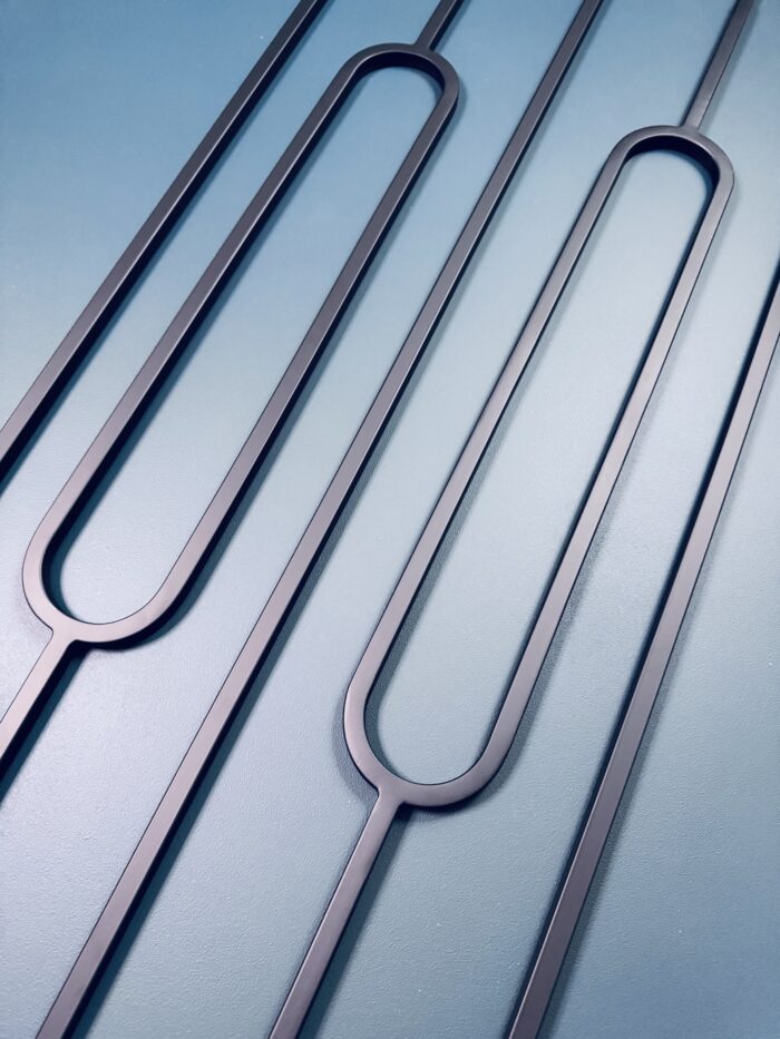 black oval and square metal spindles