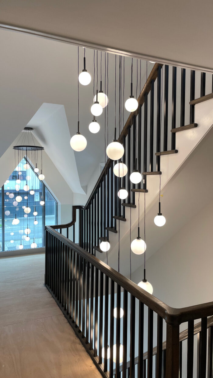 Staircase with black metal spindles