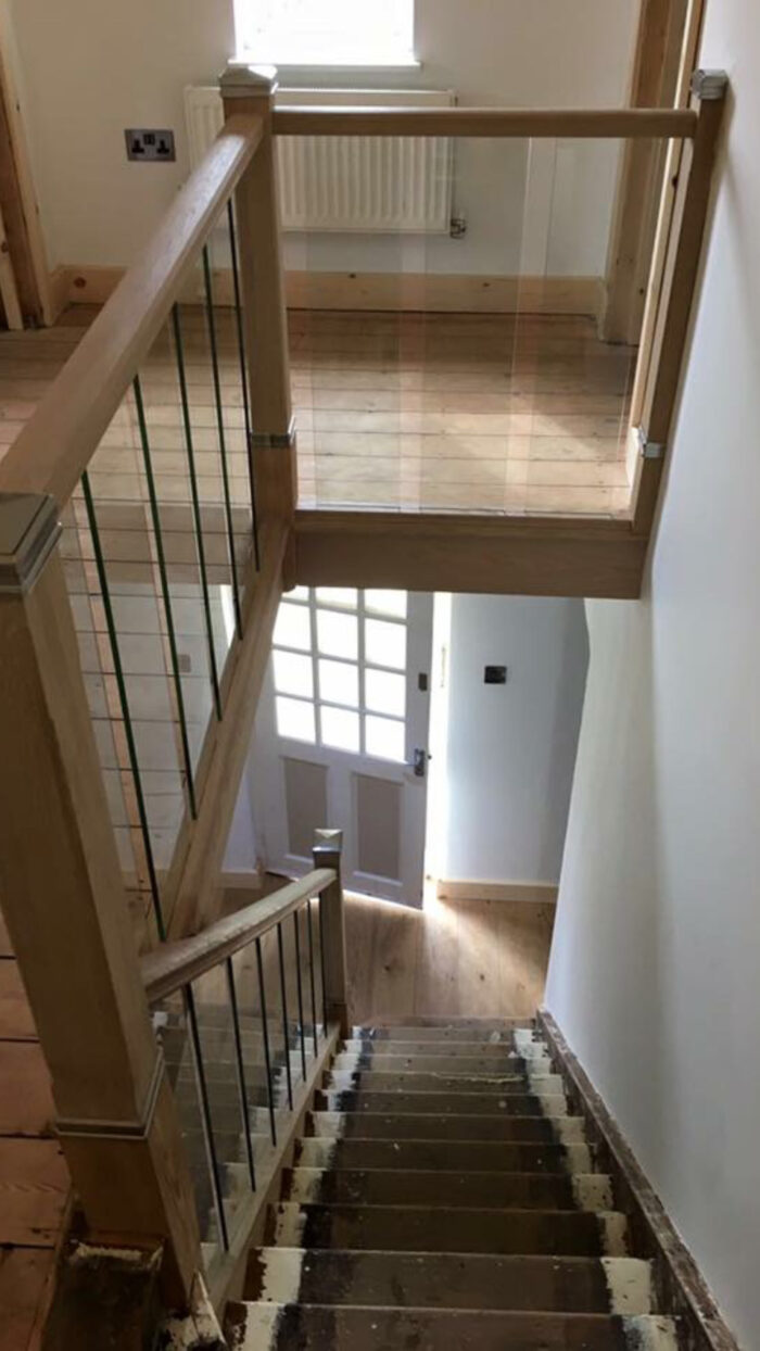 Oak staircase with glass panels