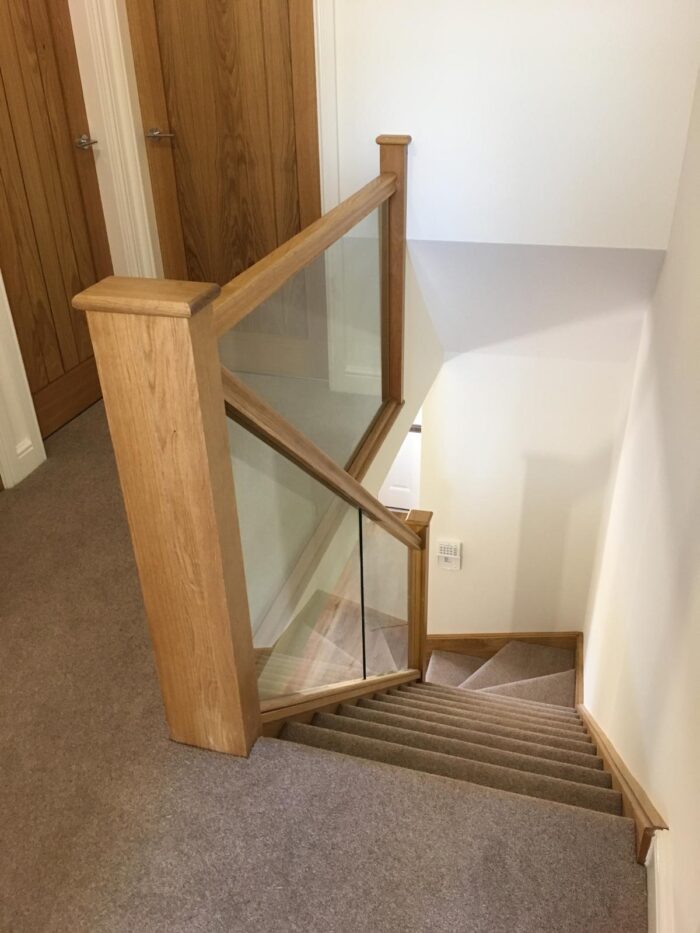 Oak staircase with glass panels