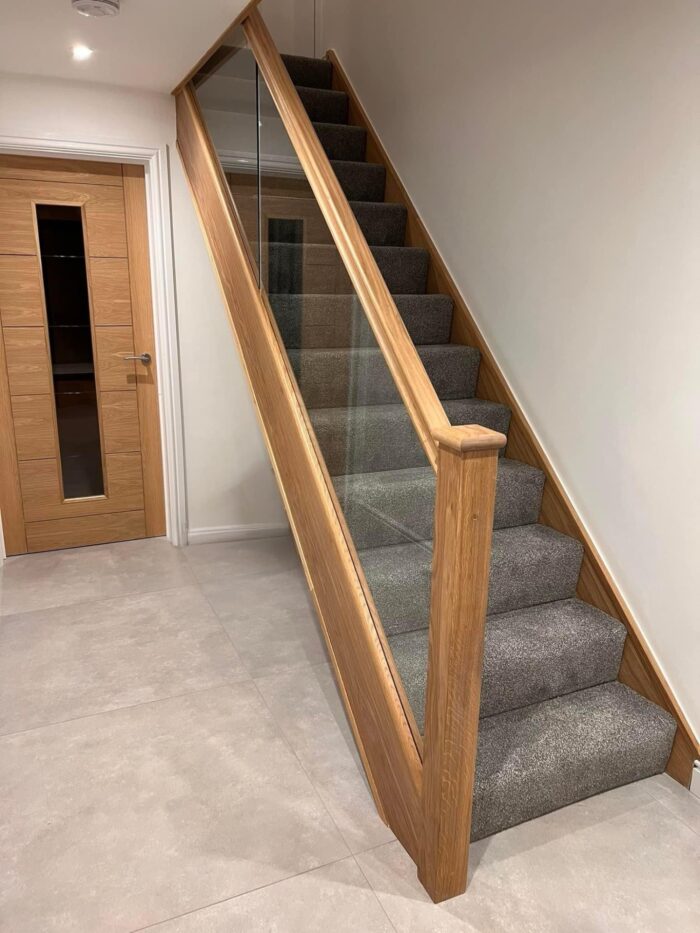 Oak staircase with glass panels