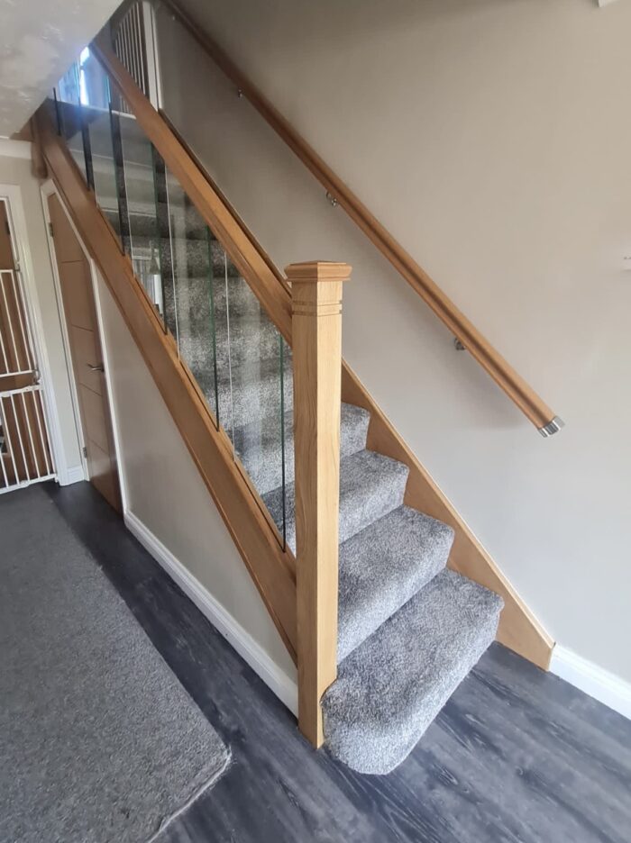 Oak staircase with glass panels