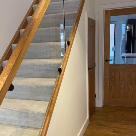 Glass Panels With Black Brackets